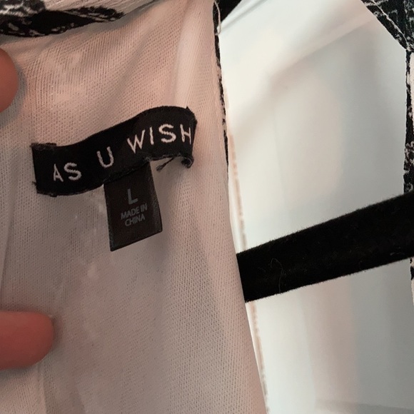 Flirty high low  romper with exposed shorts - Picture 4 of 4